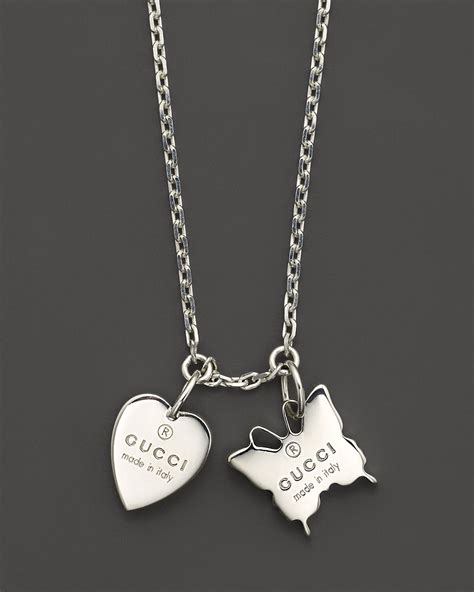 butterfly bracelet gucci|heart necklace with Gucci trademark.